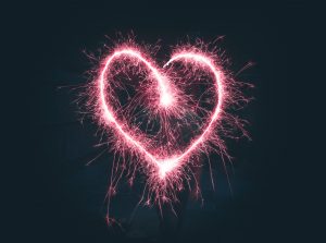 a picture of a heart made out of fireworks to support the idea that we are happy about our family member coming home from substance abuse treatment