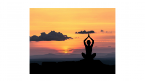 a person in a yoga pose in a sunset to reinforce the idea that contemplative movement is a beneficial habit in substance use recovery